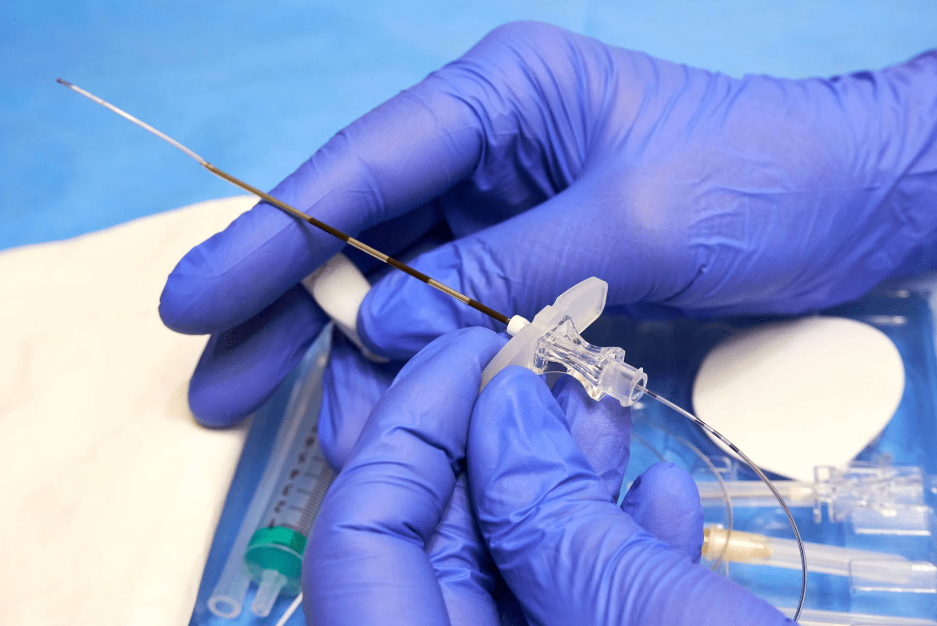 Doctor holding an epidural steroid injection needle.